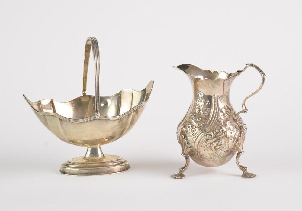 2 pcs English sterling silver: creamer and basket: One English George III Silver footed Creamer Circa 1759 Hallmarked WB in shaped cartouche, excellent condition, approx 4 OZT, and one English Edwardian Silver Sugar Basket make George Nathan & Rid