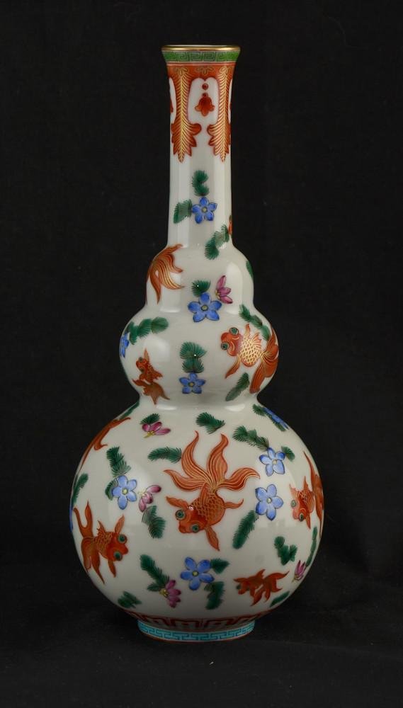 Chinese porcelain bottle form vase with goldfish: 10.75" tall, overglaze rubber stamp mark on bottom, excellent condition, age unknown.