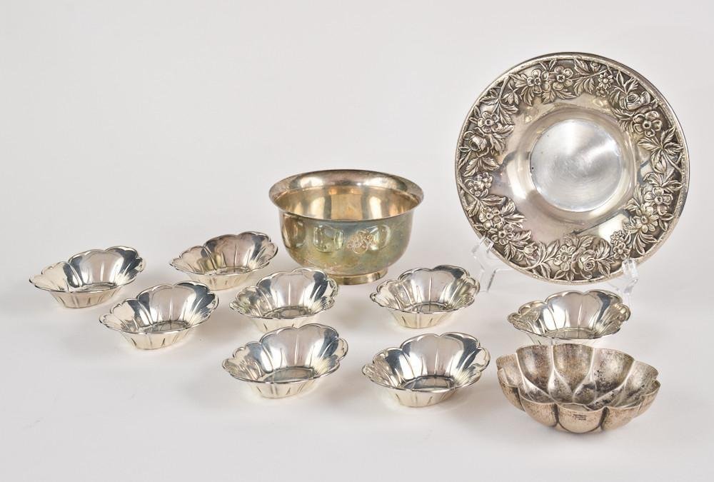 Group of 11 pcs sterling silver: Consists of: Eight Black Starr & Front nut dishes each 3.5" and weighing a total of 8 OZT, One 4" Monogrammed Tiffany & Co. Paul Revere Style Bowl: 4.3 OZT, One 3.5" Tiffany &am