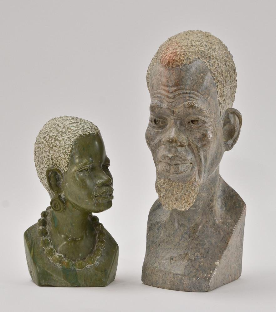 Two African Zimbabwe Shona Stone Carvings: Two Light Green Serpentine style carved stone busts. One 12.5" tall and the other 8.5" tall. each well rendered, and skillfully carved. one signed GIDEON CHIDONUO and the other signed SHADY.