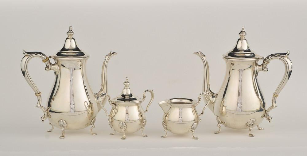 Fischer 4 pc Sterling Silver Tea Set: Two coffee / tea pots each 9.5" tall, and creamer sugar approx 4" tall. Excellent condition. No Monograms. total weight: 44 OZT