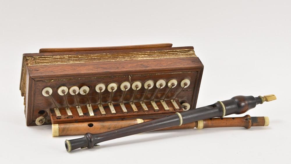 Group of 19th C. Musical Instruments: A hand turned and carved ivory-mounted three-section flute: 14" good condition, A walnut (or rosewood) bone and nickel mounted whistle: 15" very good condition, working, two -sections, along