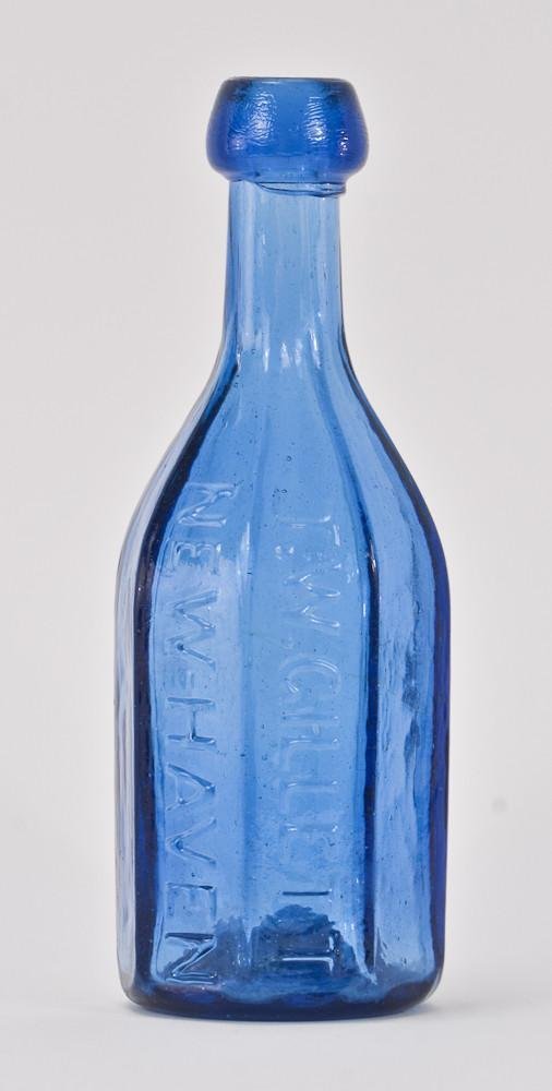 T.W. Gillette New Haven CT Bottle: This Antique Handblown Blue / Cobalt Glass Bottle bears an iron red pontil mark, applied "blob" top excellent condition, very clear, 7.5" tall, a rare and hard to find bottle.