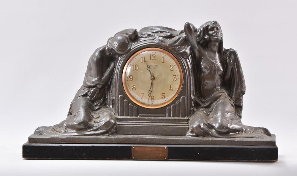 Ingraham Art Deco Figural Mantle Clock: Painted Cast metal case on a wood base. Presented as "Official system trophy for Contract Bridge Season Championship 1932-1933" Electric movement, Good condition. 13" Tall, 23" Wid