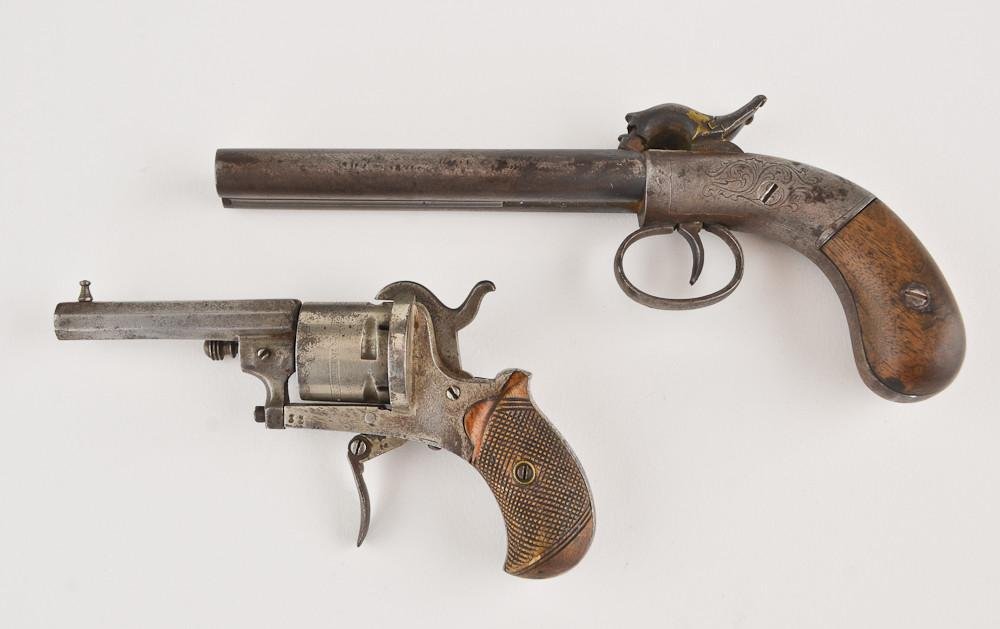 Two Antique Pistols: The first a Bruce and Davis Cast Steel Double percussion cap derringer 9" overall, 5" barrel with hexagonal bores, scrollwork body, original wood grips. Hammers and trigger function, overall