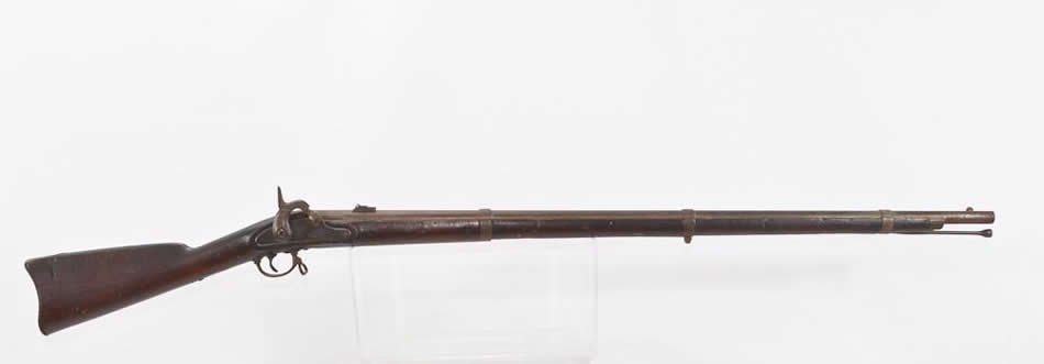 U.S. Springfield 1863 Rifle: Overall Length 56" barrel length 40". Stock is solid, but shows many marks from use, exterior of barrel has a fine and thin layer of rust, bore is pitted and chunky. Caliber unknown. trigger