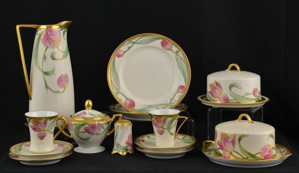 15 pcs Walter Wilson Tulip Pattern China: The Hand Painted Pieces with finely detailed French Tulips and gilt accents. Size varies. PLEASE NOTE A CONDITION UPDATE: chips have been found on two cups, two saucers, and on the sugar bowl. The pit