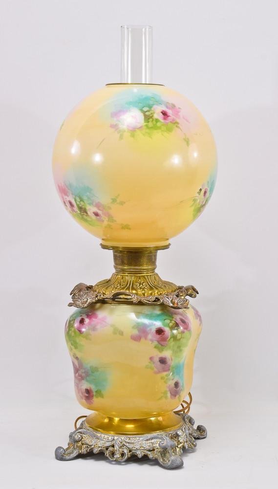 Victorian GWTW glass kerosene Lamp: Hand painted floral decoration on this impressive Gone with the Wind table lamp from the late 19th Century. Matching Base and Shade. Unsigned, burner marked "Made in U.S. of America" Electri