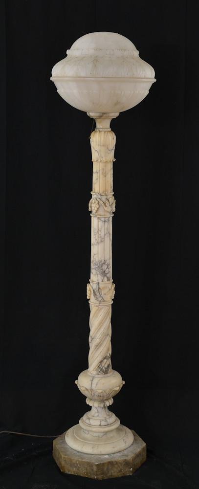 Alabaster Floor Lamp: Alabaster and or Marble construction.Likely Italian. 66.5" tall, Shade 15" wide Shade missing Finial. shade in two pieces. Bottom half tight and excellent, top half shows lines along variega