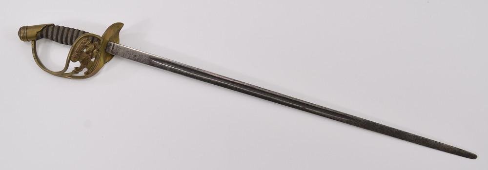 WWI era Prussian 1889 Model Officers Cavalry Sword: Wilhelm II eagle on the guard, sharkskin and wire wrapped hilt, blade marked: GERMANY. short blade: measures 19" from the hilt. overall length: 24". no scabbard. guard is loose, blade is pit