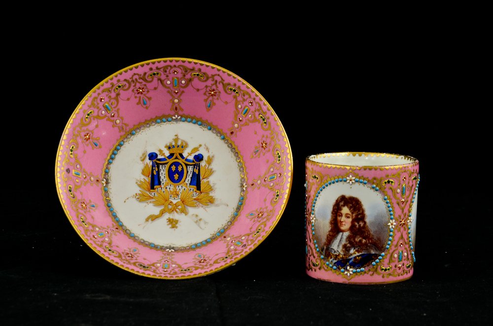 Sevres Porcelain Jeweled Cabinet Cup and Saucer: 19th Century, Gilt and Enamel decorated Portrait piece with three finely detailed portraits. small areas of morriage loss. Cup and saucer are not damaged, or repaired. some gilt loss to edges. Blue in
