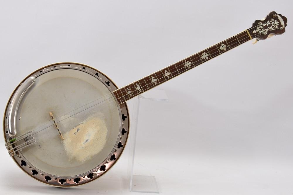 William Lange Tenor Banjo: Marked inside of resonator: LANGE-MADE Pat. 1576981 and marked outside tone ring: Pat. 1550826 otherwise, no serial number or model number indicated. 33" x 13" very good condition. straight 