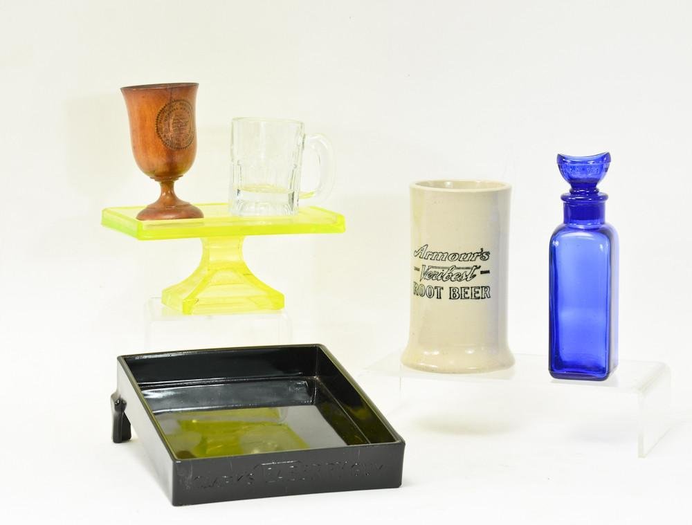 Group lot of advertising objects: Includes Armours veribest pottery Root Beer mug, a small A & M Root Beer bug, a small pharmaceutical turned wood cup, a blue glass Wyeth eye wash bottle, A Vaseline Glass Clarks Teaberry CHewing G