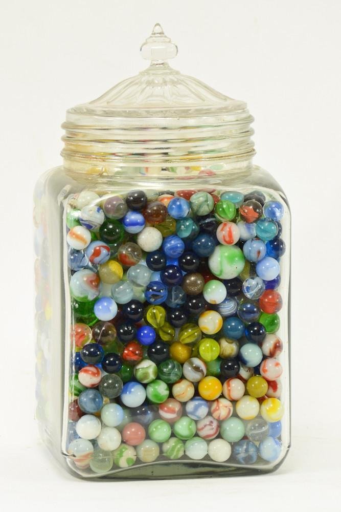 Glass Jar full of Antique and vintage marbles: Correctly guess how many are inside and win a prize! 12" tall, 6" x 6" wide.