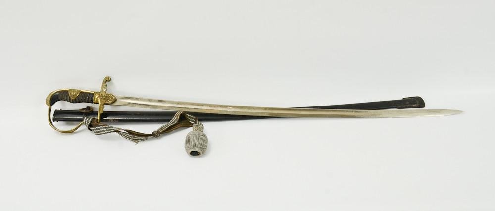 WWII Nazi German Officers Sword: Original Knot, Steel Wrapped Bakelite handle, only very light and minor blade oxidation, light oxidation to metal parts of hilt, Blade and hilt unmarked, light paint loss to scabbard. overall length: 