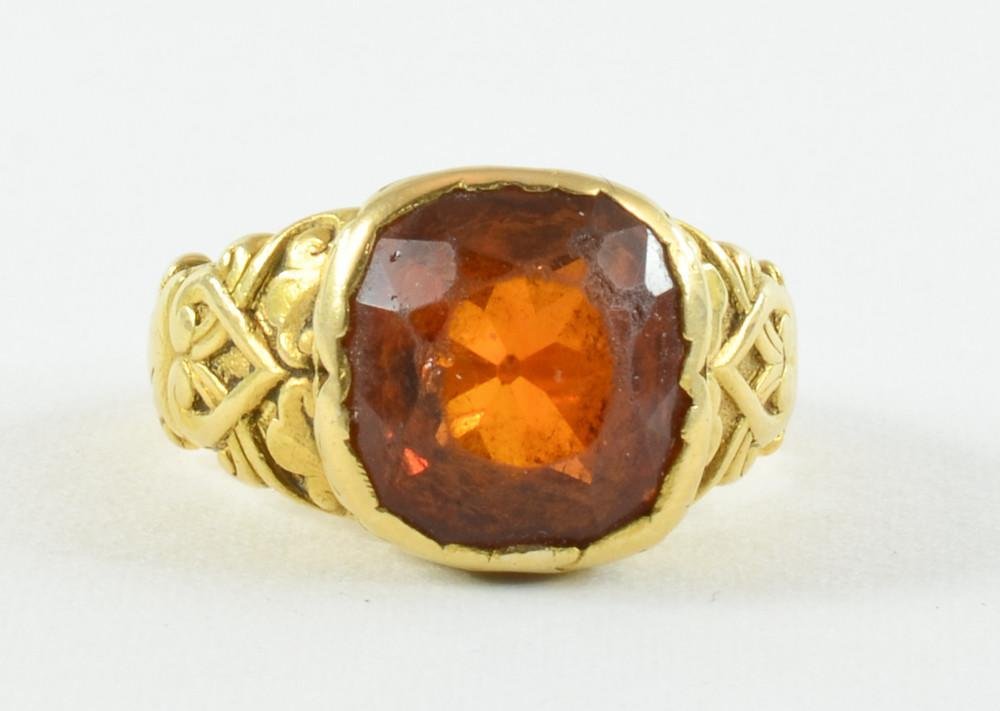 Ladies 18K Estate Citrine Ring: This heavy and high quality Ring tests for 18K, and bears the remains of a hallmark that is most likely Tiffany & CO. The stone tests for Citrine, but bears quite a bit of wear to the top. Gold sh