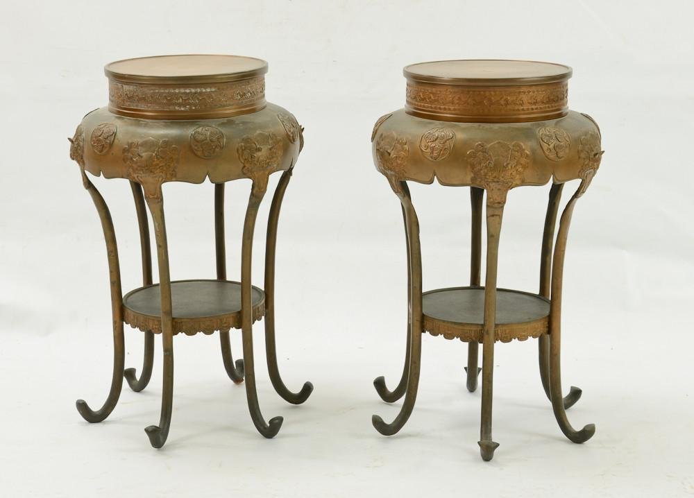 Pair of Japanese Bronze Plant stands or tables: Cast Bronze with Mon, horse and dragon decorations. Excellent condition. 24" tall, 16" wide. Decorative pieces for the export market, 20th Century. unsigned and unmarked. Included are