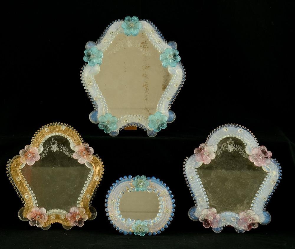 4 Mid Century Venetian Glass Dresser Top Mirrors: Group of four dresser top Venetian glass decorative mirrors. Mid Century. Very good shape. Mirror glass has some speckles, (looks like foxing) glass frames, excellent. Iridesce