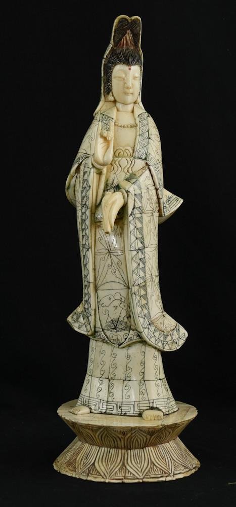 Hand Carved Chinese Ox Bone Guanyin Statue: Chinese Ox Bone Buddha Statue. Hand carved, approximately 7" x 20" This carving is very nice overall. Colored with black, red, and green pigments. 