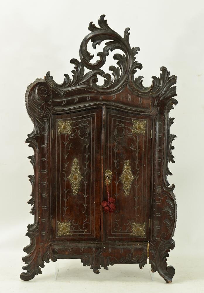 Ormolu mounted Rococco Carved Wall Cabinet: 19th Century. Possibly Italian. with working key. interior shelves loose, repairs to front surface. 32" tall, 19.5" wide 7" deep.