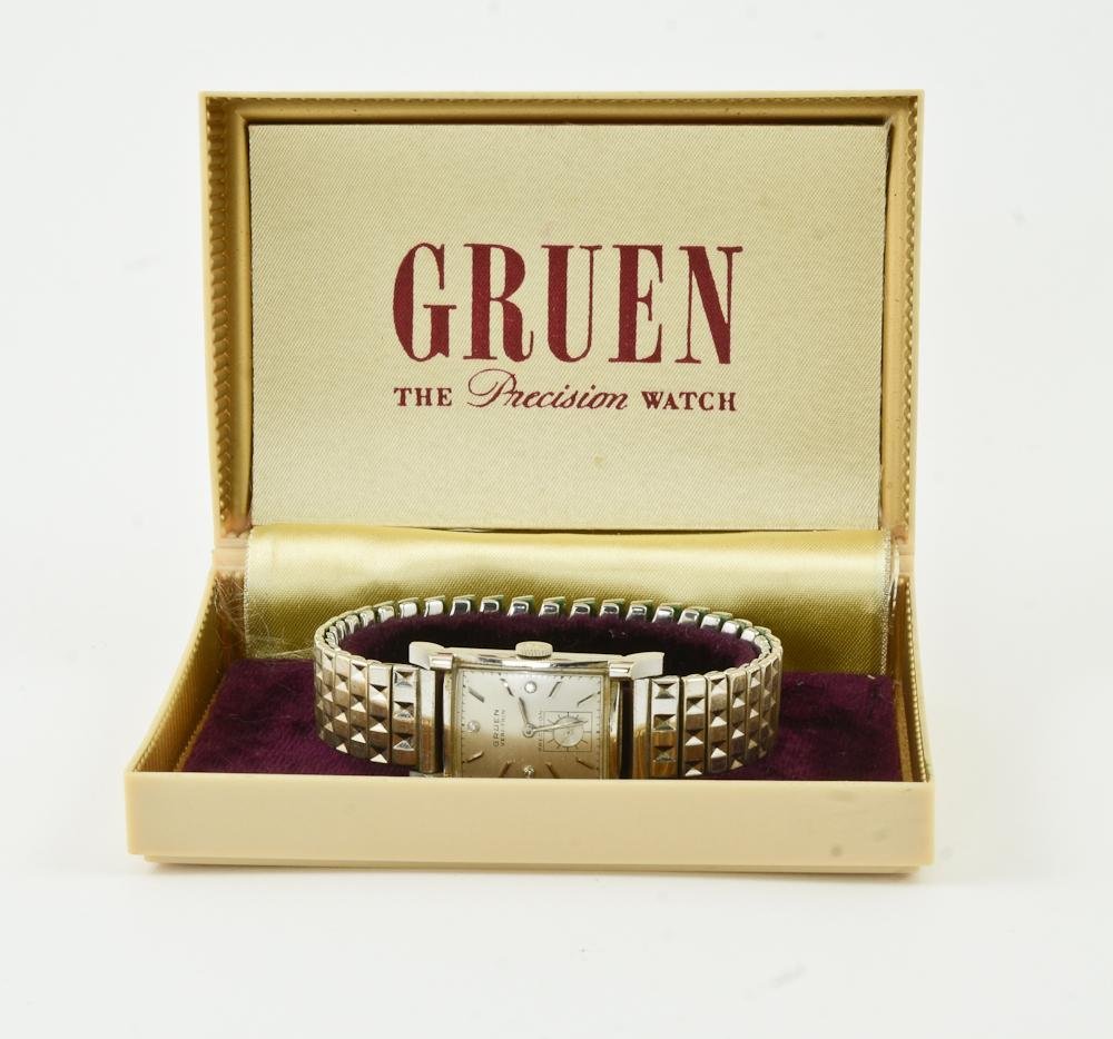Men's Vintage 14K Gruen Wrist Watch: This 14K Gold Presentation Wrist Watch is a Gruen Veri-thin Precision in the original Box. Engraved on the back of the case: To J.E. Connor from his fellow Employees Boston Naval shipyard Sept. 1950.