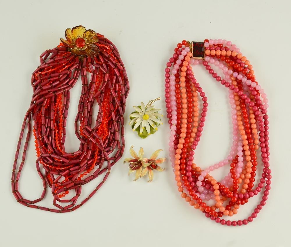 Group of Hattie Carnegie etc. Fashion Jewelry: This lot of designer Costume jewelry includes: two Hattie Carnegie 2.5" Signed Floral enamel pins(minor chips), a Hattie Carnegie 22" signed eight-strand beaded necklace with jeweled clasp (