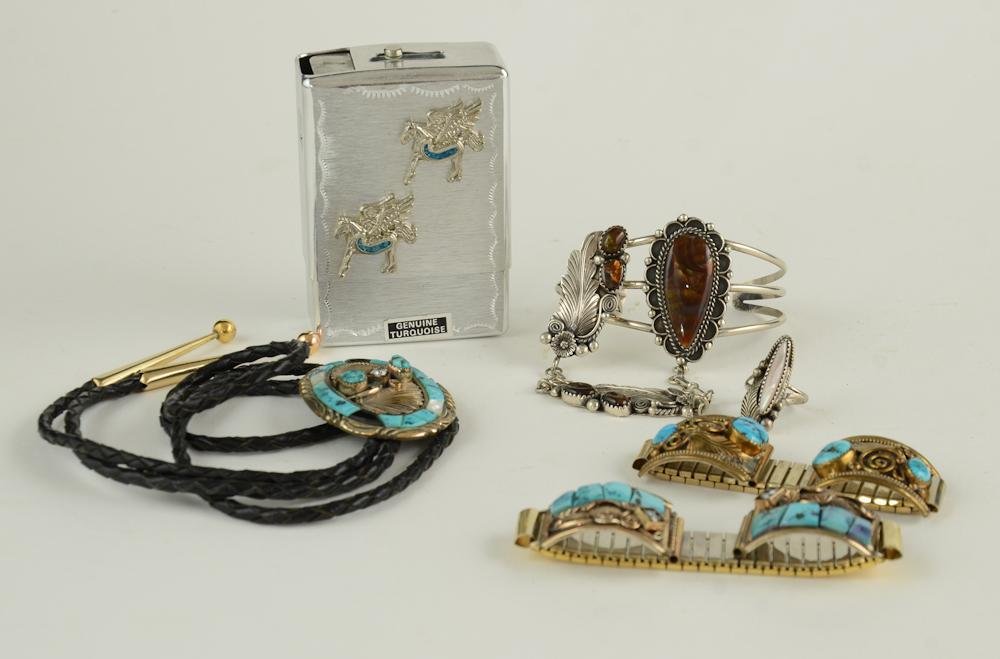 Collection of Native American Silver Jewelry: contains a turquoise Navajo Indian Cigarette case, Two Silver Watch Bands: One marked "P" and STERLING, and the other marked "S.Ray G.F. Platero" a silver bolo tie, a mother of pea