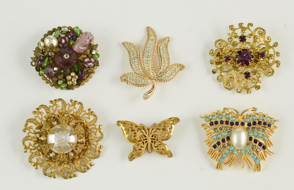 Six Vintage Fashion Costume Jewelry Pins: Signed Miriam Haskell, Pauline Rader, A-F Paris, and Kramer. All in very good condition, size varies, each approximately 1"-2"