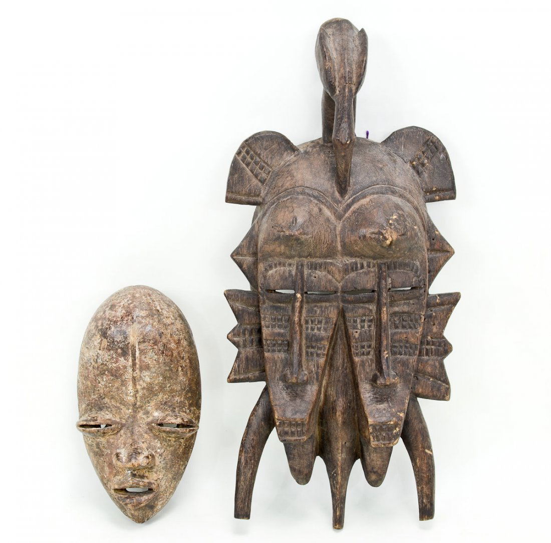 Two Small caved wood African Masks (1 of 4)