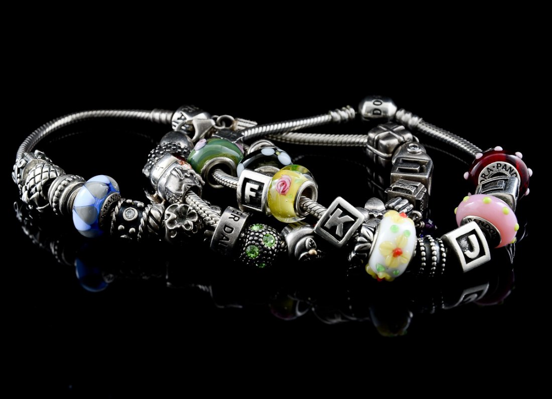 Three contemporary Silver charm bracelets (1 of 4)