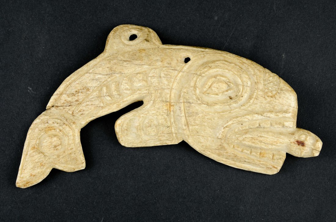 Northwest Coast carved Bone Fish: Eskimo or Inuit style fish amulet or pendant, carved bone. Likely 19th Century. some minor splitting, 4" x 7"
