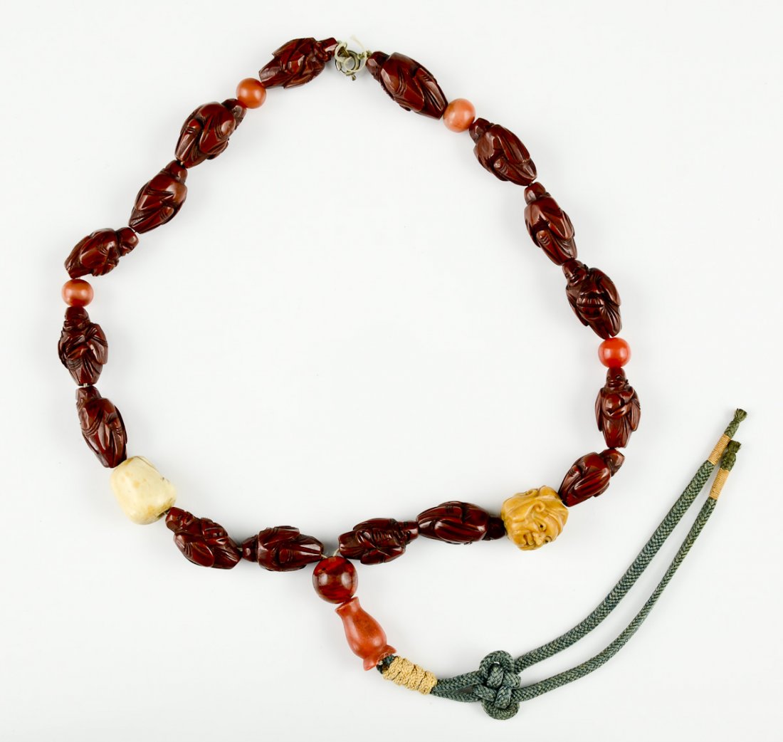 Asian Buddhist Prayer Beads: Carved wood (or seed) figural beads with carved bone heads. Chinese or Japanese. Late 19th or Early 20th Century. 16" long