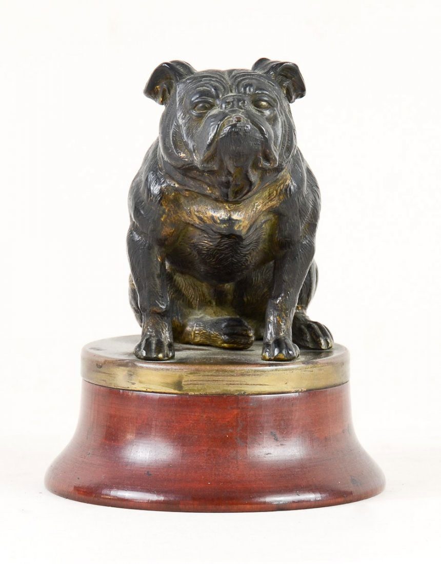 Antique Cast Metal Bulldog: Likely Continental, Early 20th century cast metal and gilt bulldog mounted upon a wooden base. Unsigned, gilt losses, overall very good. 5 1/2" high and weighs 1 pound. The sculpture has natural tarni