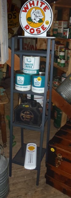 white rose display stand: metal shelf display stand restored to white rose logos *** NOTE this lot is the shelf and top sign only items on shelves not included