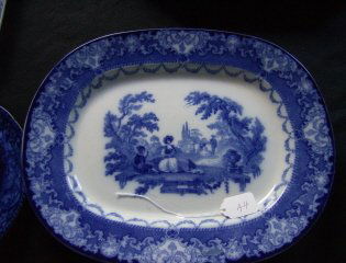 Flow blue platter: A 15" platter with a fine bleeding transfer decoration "watteau