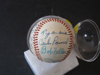 Autographed baseball: Signed by national league greats Roy McMillan,Bob Feller, Hank Aaron, Warren Spahn, Dick Grout and 10 more sigs.