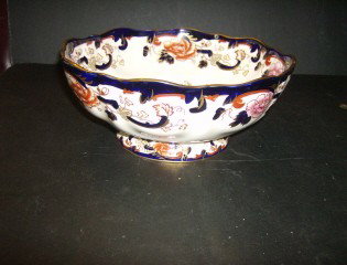 Ironstone bowl: a 10' bowl with Mason's mark and in mandalay pattern