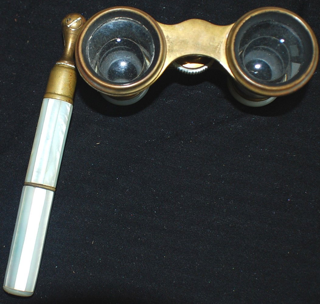 Antique opera glasses with handle: Antique brass and mother of pearl opera glasses with handle, marked “VERDI PARIS”
