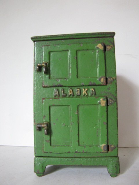 Toy cast iron ice box "Alaska", 3 1/2" tall: Toy cast iron ice box "Alaska", 3 1/2" tall