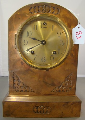 1914 COPPER OVER BRASS ANSONIA CLOCK: Approx 10.25" tall, face has Arabic numbers, 8 day time strike, working condition, key not available, buyer arranges shipping, we can recommend local shipper.