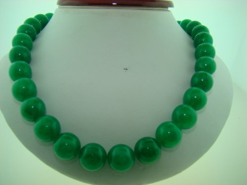 GREEN JADE BEADED NECKLACE: Approx. 11mm jade balls on a 32" necklace, shipping fee will be added to invoice.