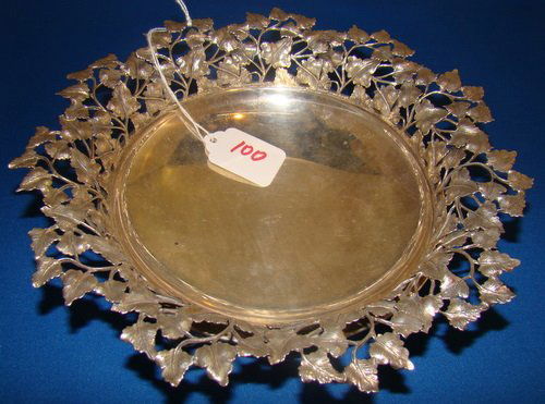 VINTAGE SIGNED BUCCELLATI SILVER OPEN WORK BOWL: Approx. 9" in diameter, marked "925", with open work of leaves, with original sticker of purchase from the 100 Carati - jewelry store in Italy, buyer arranges shipping, we can recommend local shipper.