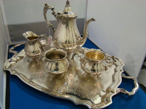 LARGE GRAND BAROQUE SILVER PLATED TEA SET: Five pieces consisting of; 12" Coffee Pot, Sugar, Creamer, and Waste; accompanied with Silver plated tray, buyer arranges shipping, we can recommend local shipper.