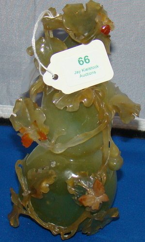 VINTAGE CARVED JADE GOURD SHAPED COVERED VASE : Circa mid 20th century with applied flowers and leaves, approx. 7" tall, excellent condition, buyer arranges shipping, we can recommend local shipper.