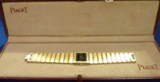 LADIES PIAGET 18KT YG WATCH: LADIES PIAGET 18KT YG WATCH With case 7" excellent condition