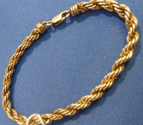 LADIES STERLING & 14KT GOLD ROPE BRACELET: LADIES STERLING & 14KT GOLD ROPE BRACELET approx 7 1/4" long; lobster claw clasp;in the style of David Yurman