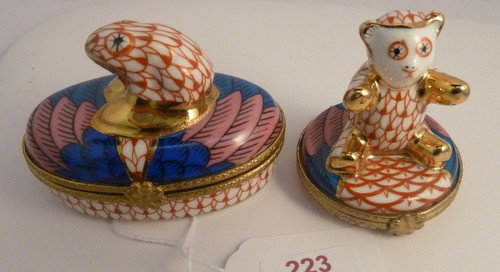 PAIR OF PORCELAIN PILLBOXES: PAIR OF PORCELAIN PILLBOXES in the manner of Herrand;each approx 3" long