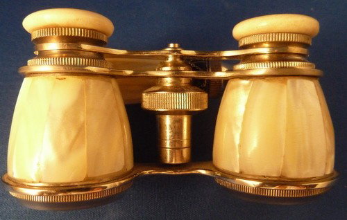 ANTIQUE MOTHER-OF PEARL OPERA GLASSES: ANTIQUE MOTHER-OF PEARL OPERA GLASSES French with handle;excellent condition we can recommend local shippers
