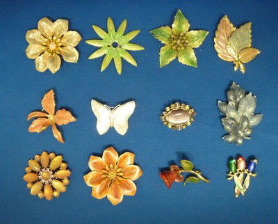 LOT OF LADIES PINS COSTUME JEWELRY: LOT OF LADIES PINS COSTUME JEWELRY eleven pins total most with rhinestones some signed:Liz Claiborne;KC;Anne Klein we can recommend local shipper