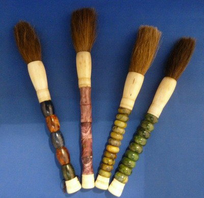 FOUR LARGE JADE BONE & HORSEHAIR CALLIGRAPHY BRUSH: FOUR LARGE JADE BONE & HORSEHAIR CALLIGRAPHY BRUSHES each approx 12" long we can recommend local shipper